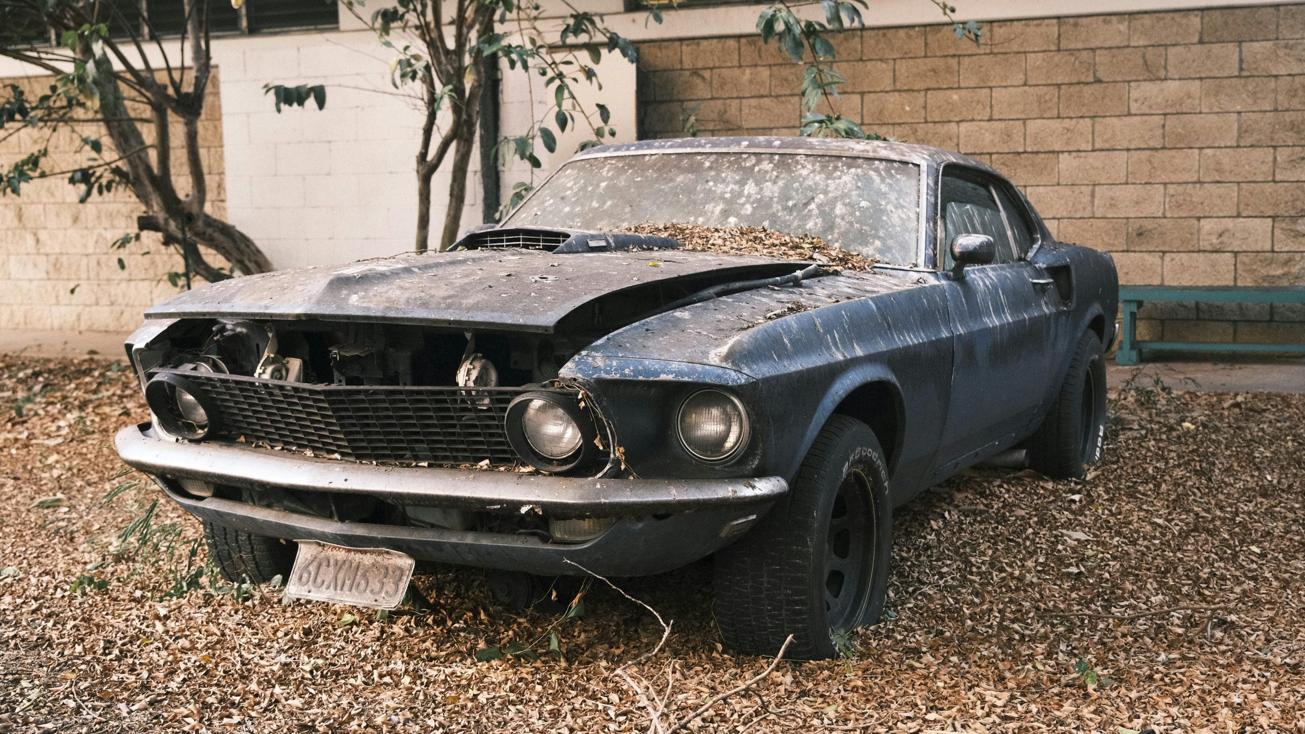 Remove that junk car from your property and avoid getting fined