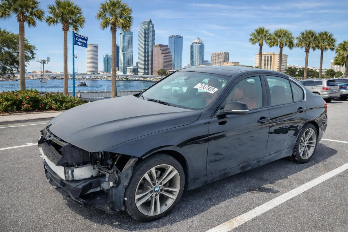 Junk car sold for instant cash in Tampa Florida — Fred's Auto Removal buys damaged wrecked and non-running vehicles in any condition