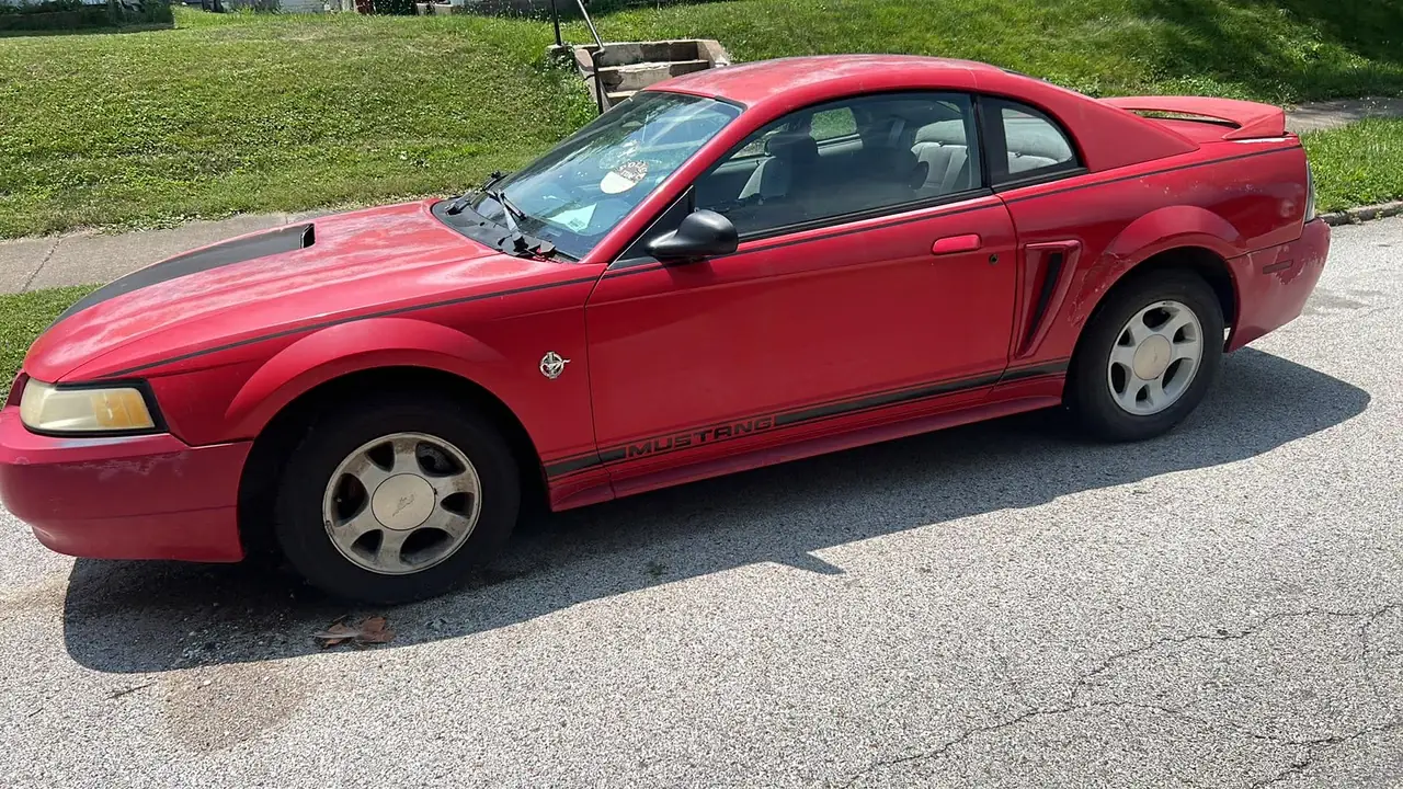 1999 Ford Mustang purchased for junk car service in New York 1999 Ford Mustang junk car bought for cash in New York